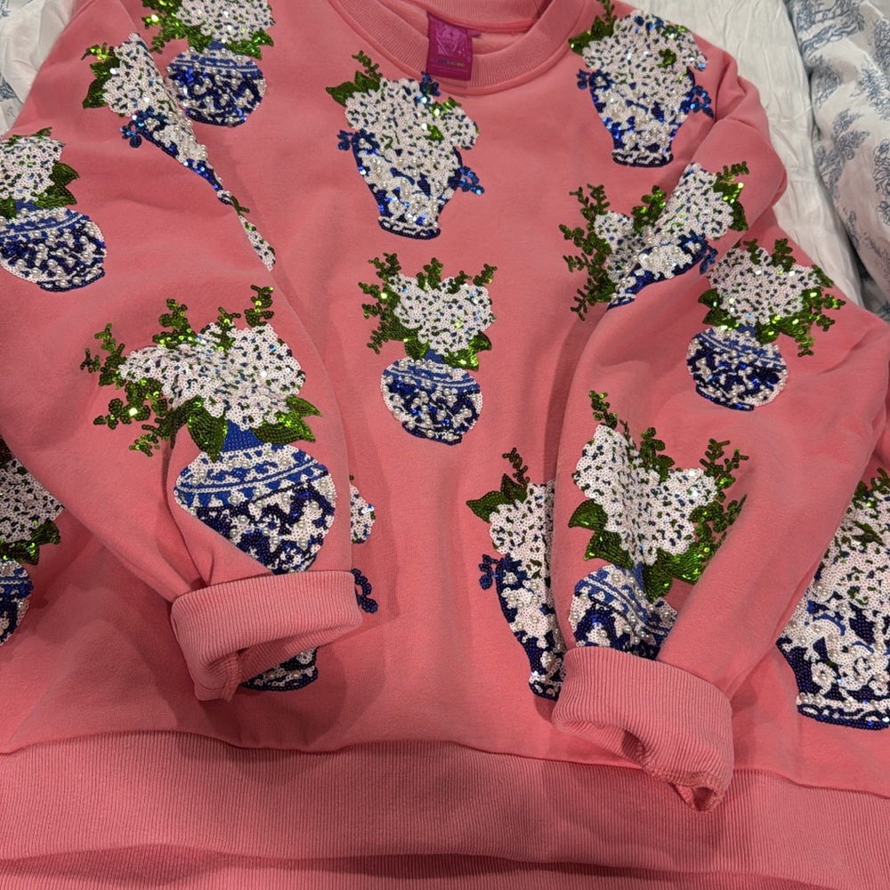 QUEEN OF SPARKLES Pink Sweater with Blue and Green Vase Design